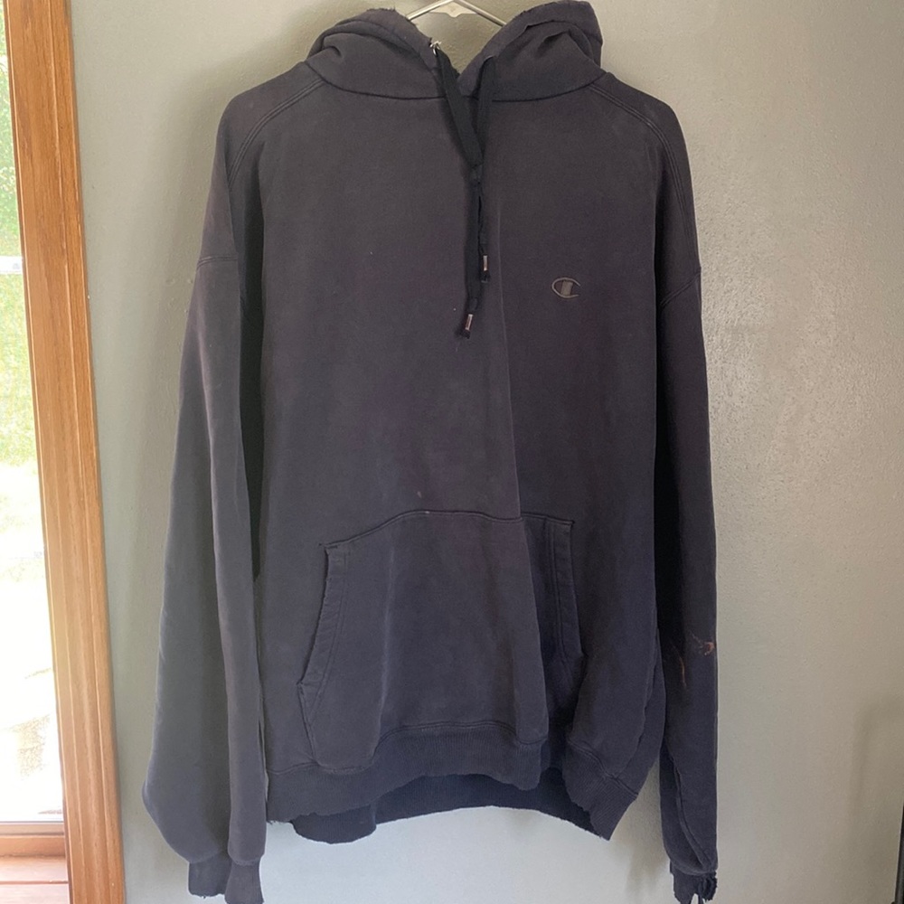 Worn in, navy Champion hoodie.